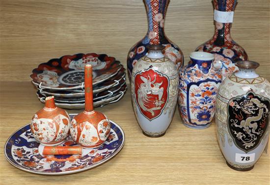 A pair of Japanese cloisonne vases, three Imari vases and four plates etc